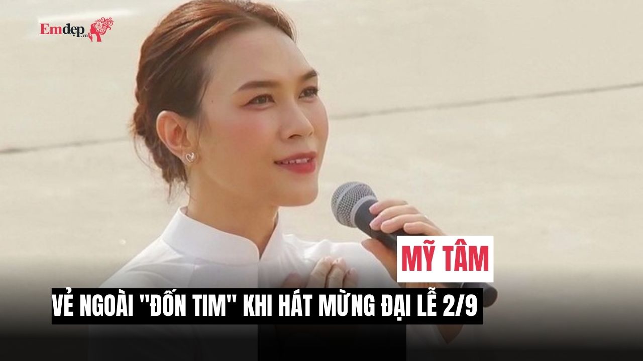 Diện áo dài trắng, trang điểm trong veo nhưng Mỹ Tâm vẫn là tâm điểm khi hát trong Đại lễ 2/9